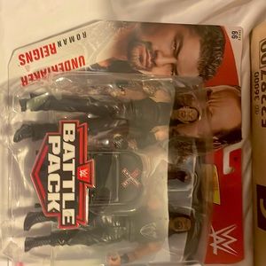 Battle pack undertaker and Roman reigns series 66